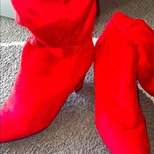Red knee high boots